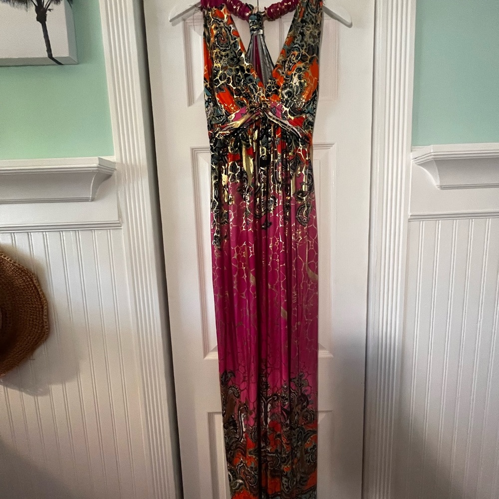Stretchy maxi dress with racer back. Beautiful colorful print with gold.
